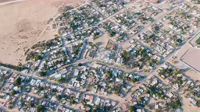 ALDOFO LOPEZ MATEOS BCS MEXICO-2023: Aerial City With A Lot Of Houses And Trees