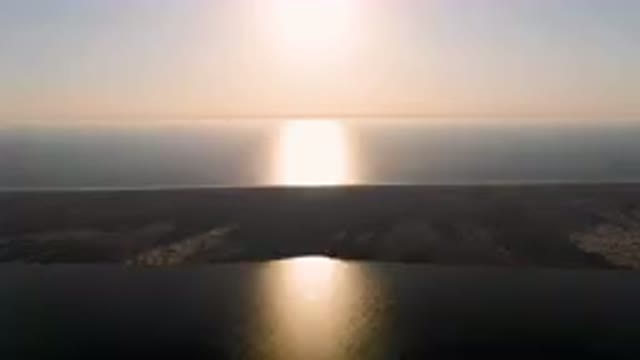 ALDOFO LOPEZ MATEOS BCS MEXICO-2023: Body of Water With a Plane Flying Over It