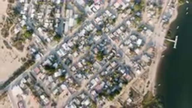 ALDOFO LOPEZ MATEOS BCS MEXICO-2023: Aerial City With River And Boat