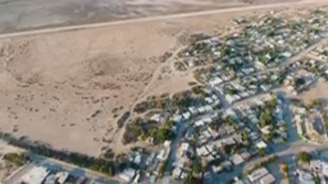 ALDOFO LOPEZ MATEOS BCS MEXICO-2023: Aerial City With A Lot Of Houses And Trees
