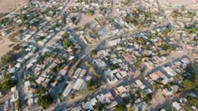 ALDOFO LOPEZ MATEOS BCS MEXICO-2023: Aerial City With Many Houses And Trees