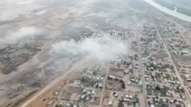 ALDOFO LOPEZ MATEOS BCS MEXICO-2023: Aerial City With River and Dust Particles