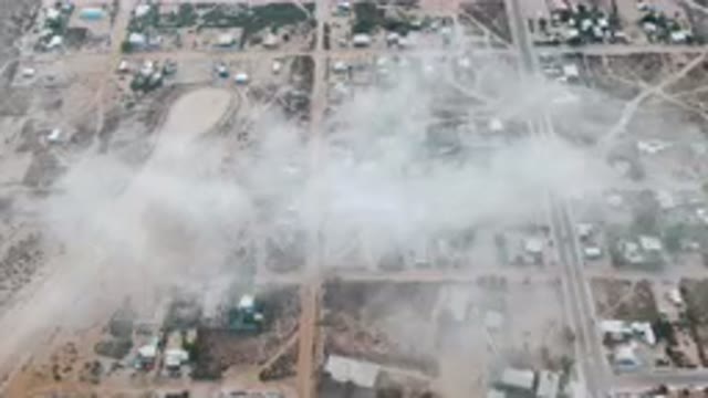 ALDOFO LOPEZ MATEOS BCS MEXICO-2023: Aerial City With Lot Of Smoke Coming Out