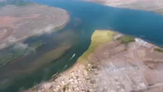 ALDOFO LOPEZ MATEOS BCS MEXICO-2023: Aerial River And City With Power Line