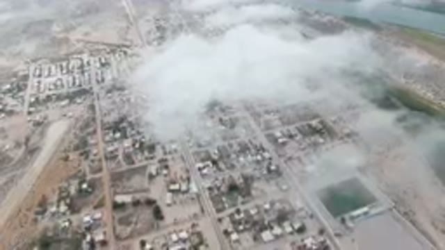 ALDOFO LOPEZ MATEOS BCS MEXICO-2023: Aerial City With River and Building Debris
