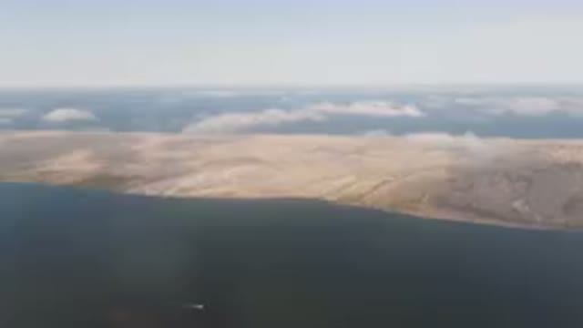 ALDOFO LOPEZ MATEOS BCS MEXICO-2023: Large Body Of Water With A Small Island In