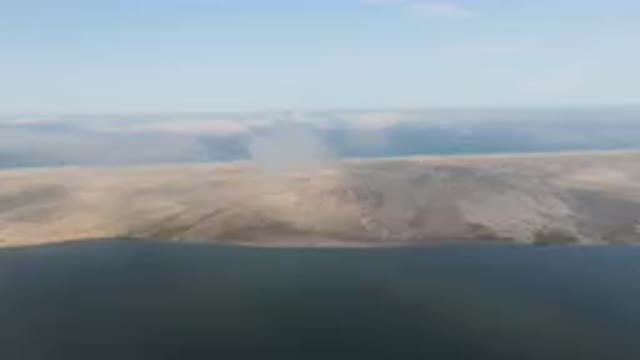 ALDOFO LOPEZ MATEOS BCS MEXICO-2023: Large Body Of Water With A Small Island In