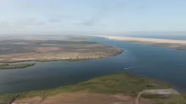 ALDOFO LOPEZ MATEOS BCS MEXICO-2023: River With A Boat In The Middle Of It