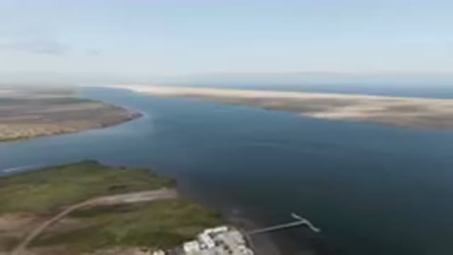 ALDOFO LOPEZ MATEOS BCS MEXICO-2023: Body of Water With a Dock and a Boat