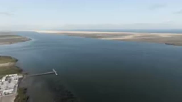 ALDOFO LOPEZ MATEOS BCS MEXICO-2023: Large Body Of Water With A Boat In It