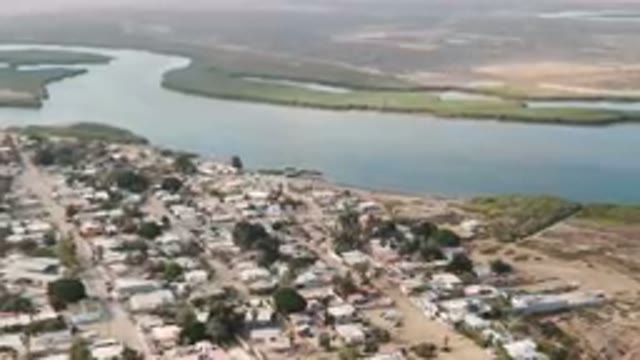 ALDOFO LOPEZ MATEOS BCS MEXICO-2023: Aerial City With A River And A Beach