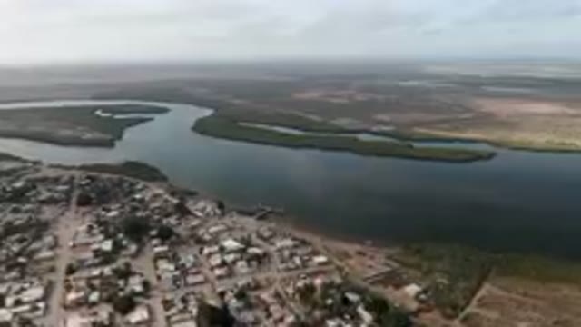 ALDOFO LOPEZ MATEOS BCS MEXICO-2023: Aerial City With A River And A Small Town
