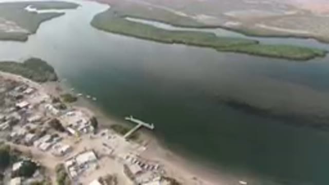 ALDOFO LOPEZ MATEOS BCS MEXICO-2023: Aerial Small Town With A Dock And A Body Of Water