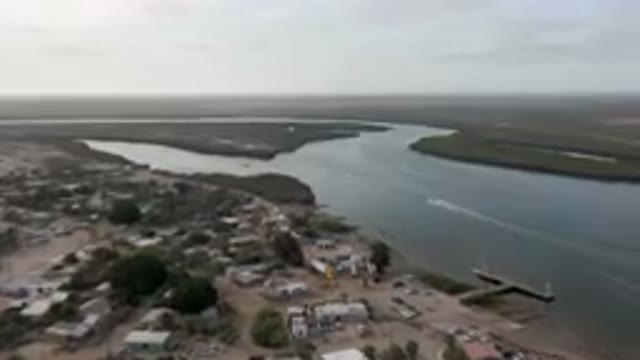 ALDOFO LOPEZ MATEOS BCS MEXICO-2023: Aerial View of Small Town With River Running