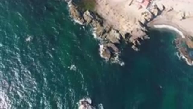 BAHIA ASCUNCION BCS MEXICO-2023: Aerial Beach With A Cliff And A Body Of Water