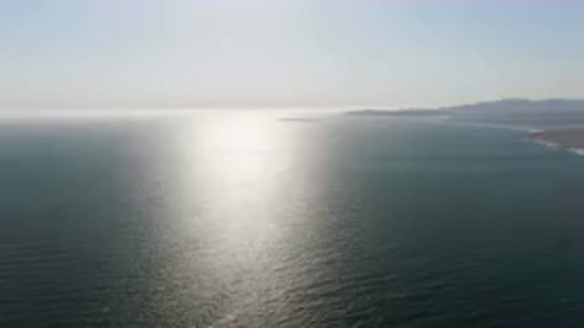 BAHIA ASCUNCION BCS MEXICO-2023: Flying Over The Ocean With A Boat In The Distance