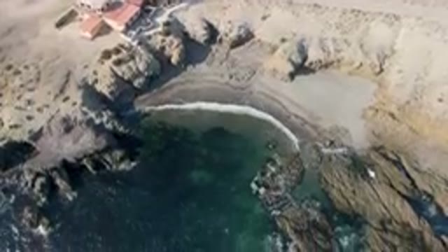 BAHIA ASCUNCION BCS MEXICO-2023: Aerial Beach With A House And A Cliff