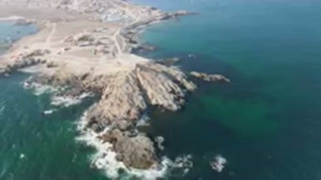 BAHIA ASCUNCION BCS MEXICO-2023: Aerial Rocky Coastline With Beach And Body Of Water