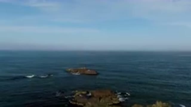BAHIA ASCUNCION BCS MEXICO-2023: Two Rocks in the Water Near the Shore