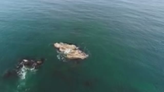 BAHIA ASCUNCION BCS MEXICO-2023: Two Rocks in the Water Near the Shore