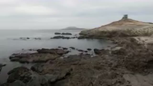 BAHIA ASCUNCION BCS MEXICO-2023: Small Lighthouse On A Rocky Island In The Ocean
