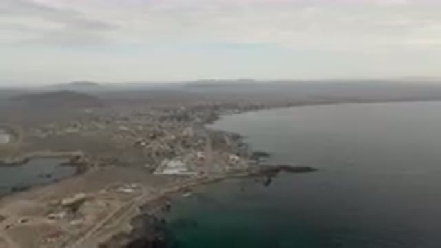 BAHIA ASCUNCION BCS MEXICO-2023: Aerial View of Small Town on Coast of Large Body of Water