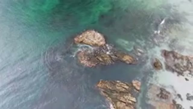 BAHIA ASCUNCION BCS MEXICO-2023: Rocks In The Water Near The Shore Of The Beach