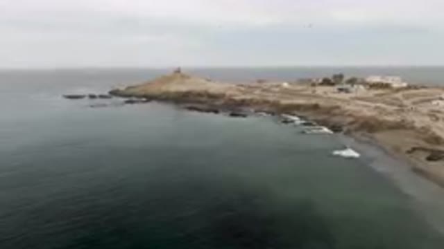 BAHIA ASCUNCION BCS MEXICO-2023: Beach With A Lighthouse And A Body Of Water