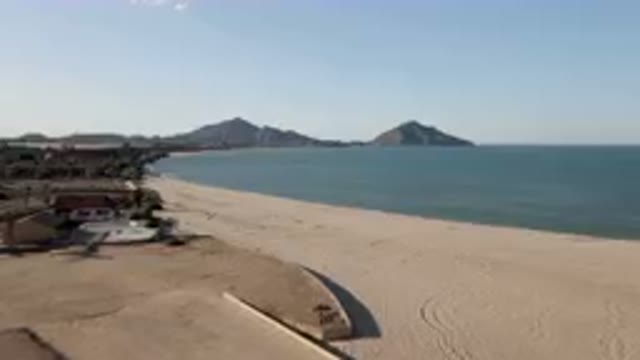 SAN FELIPE BC MEXICO-2023: Beach With A Boat In The Water