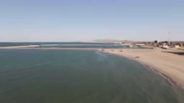SAN FELIPE BC MEXICO-2023: Beach With A Long Pier And A Body Of Water