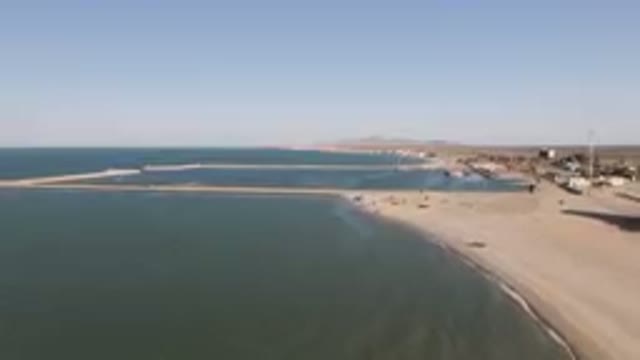 SAN FELIPE BC MEXICO-2023: Large Body Of Water With A Beach And A Pier