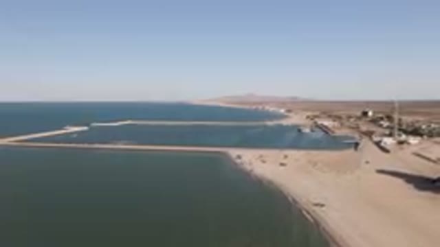 SAN FELIPE BC MEXICO-2023: Large Body Of Water With A Beach And A Pier
