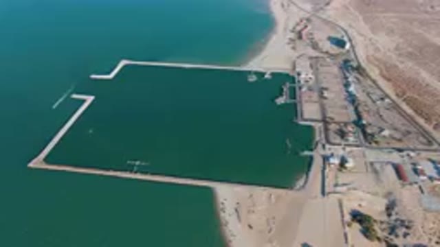 SAN FELIPE BC MEXICO-2023: Aerial Large Body Of Water With A Dock And A Beach