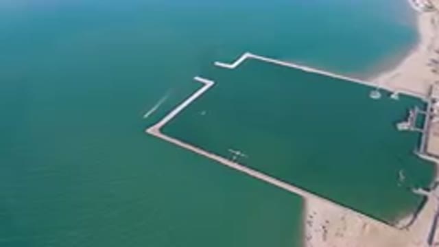 SAN FELIPE BC MEXICO-2023: Aerial Large Body Of Water With A Dock And A Beach