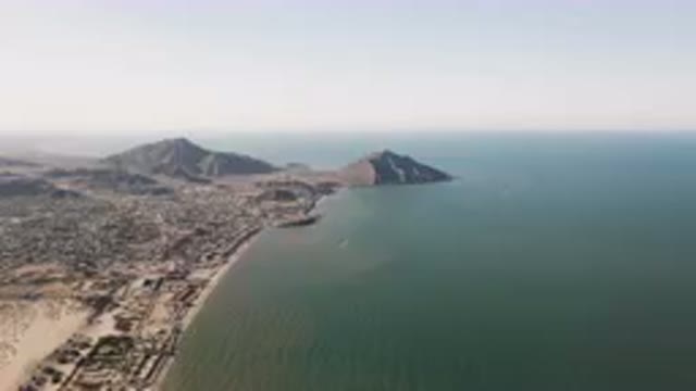 SAN FELIPE BC MEXICO-2023: Beach And A Body Of Water With A Mountain In The