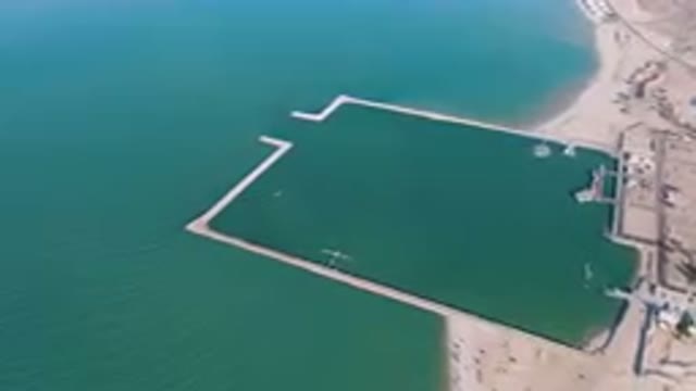 SAN FELIPE BC MEXICO-2023: Aerial View of Large Body of Water with Dock and Beach