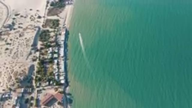 SAN FELIPE BC MEXICO-2023: Aerial Beach With A Long Line Of Houses And A Boat