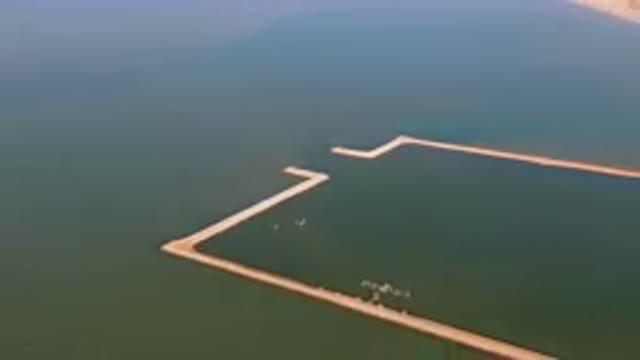 SAN FELIPE BC MEXICO-2023: Large Body Of Water With A Dock In The Middle