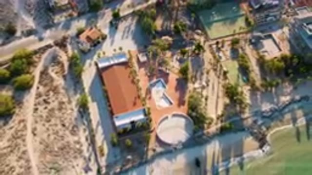 SAN FELIPE BC MEXICO-2023: Aerial Beach Resort With Tennis Court And Palm Trees