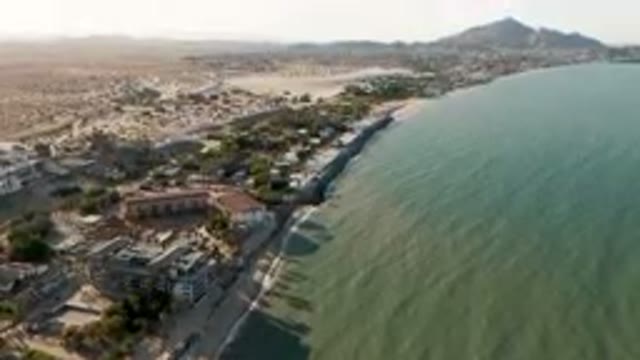 SAN FELIPE BC MEXICO-2023: Aerial Beach And A Town With A Mountain In The