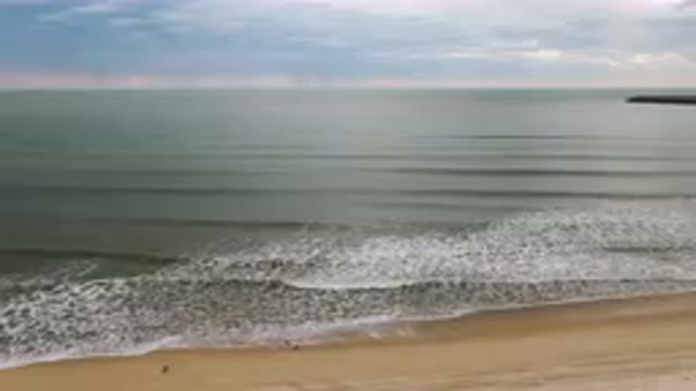 SAN FELIPE BC MEXICO-2023: Beach With A Few People Walking On It