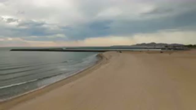 SAN FELIPE BC MEXICO-2023: Beach With A Long Pier And A Body Of Water