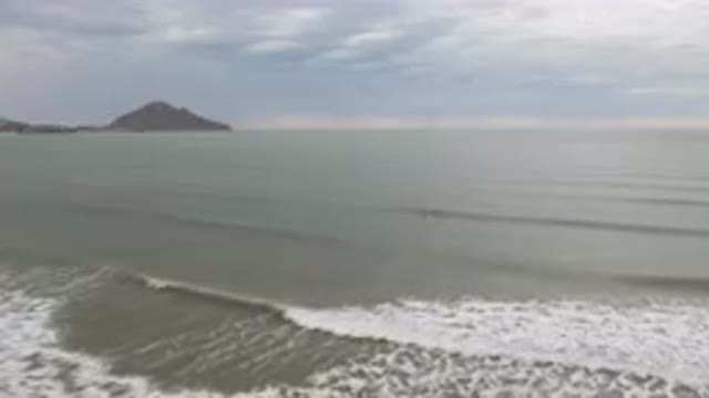 SAN FELIPE BC MEXICO-2023: Man Riding A Surfboard On The Beach