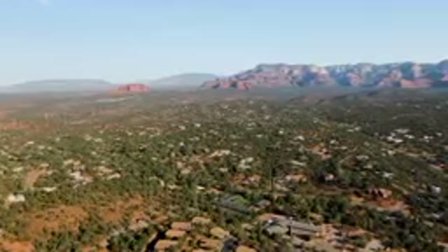 SEDONA ARIZONA USA-2023: Aerial Town In The Mountains With A Mountain Range In