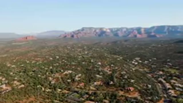 SEDONA ARIZONA USA-2023: Aerial City And Mountains With A Clear Sky