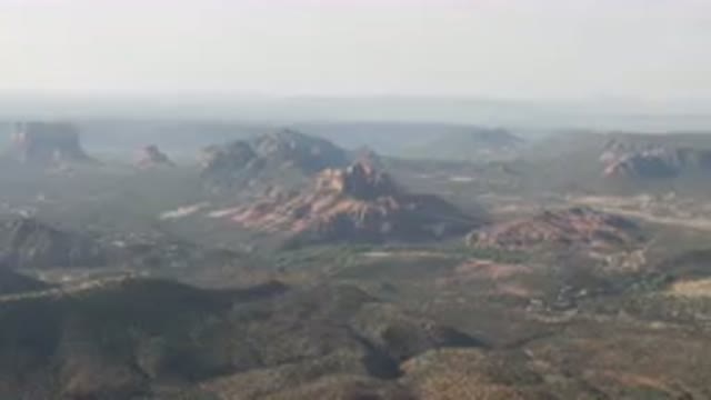 SEDONA ARIZONA USA-2023: Mountains With A Valley In The Middle Of Them And A Sky