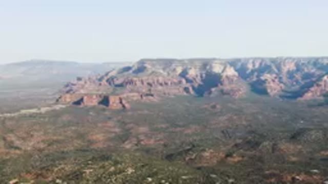 SEDONA ARIZONA USA-2023: Mountain Range With A Valley Below