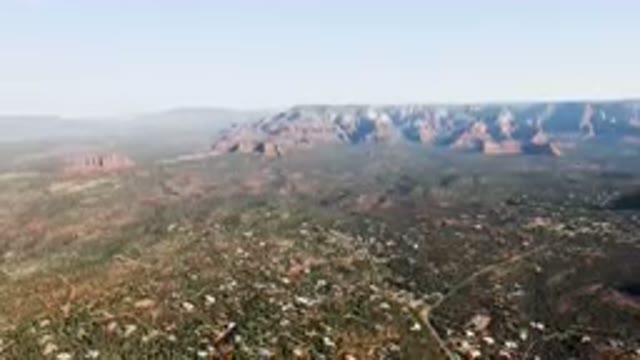 SEDONA ARIZONA USA-2023: Aerial Valley With Mountain Range In Background