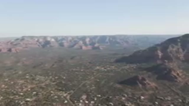 SEDONA ARIZONA USA-2023: Valley With A Mountain In The Background