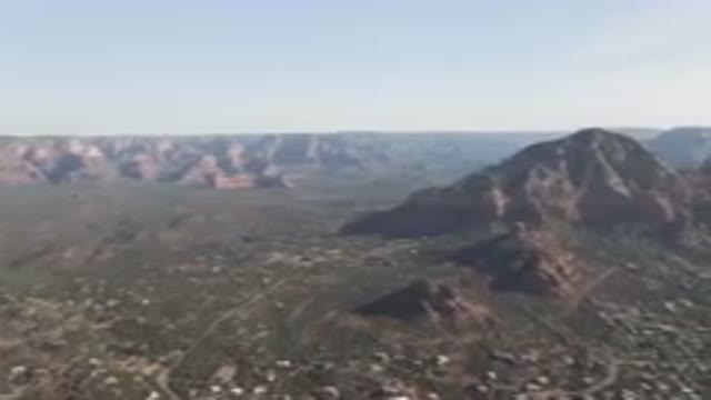 SEDONA ARIZONA USA-2023: Valley With A Mountain In The Background